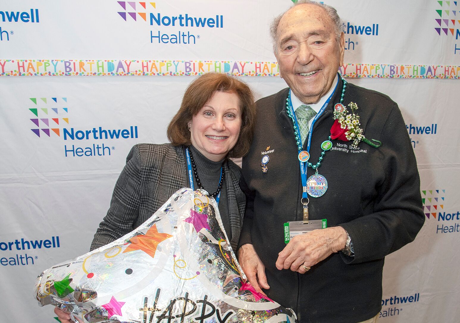 North Shore University Hospital staff celebrates the 102nd birthday of volunteer Arthur Seidman, the hospital's longest serving volunteer.